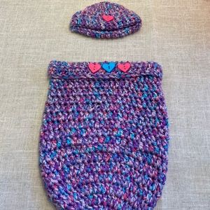 Crocheted baby hat with matching cocoon.
